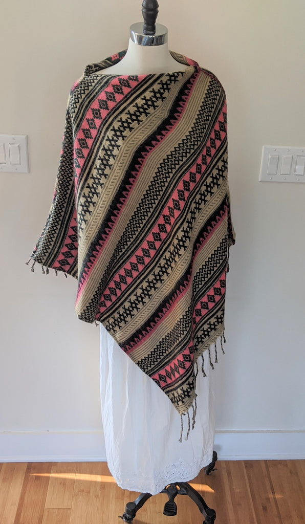 Fold over neck poncho with tassels